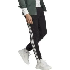 Pantalon Adidas Essentials French Terry Tapered Cuff 3-stripes IC0050 -Magasin De Vêtements adidas ic0050 essentials french terry tapered cuff 3 stripes 4 e